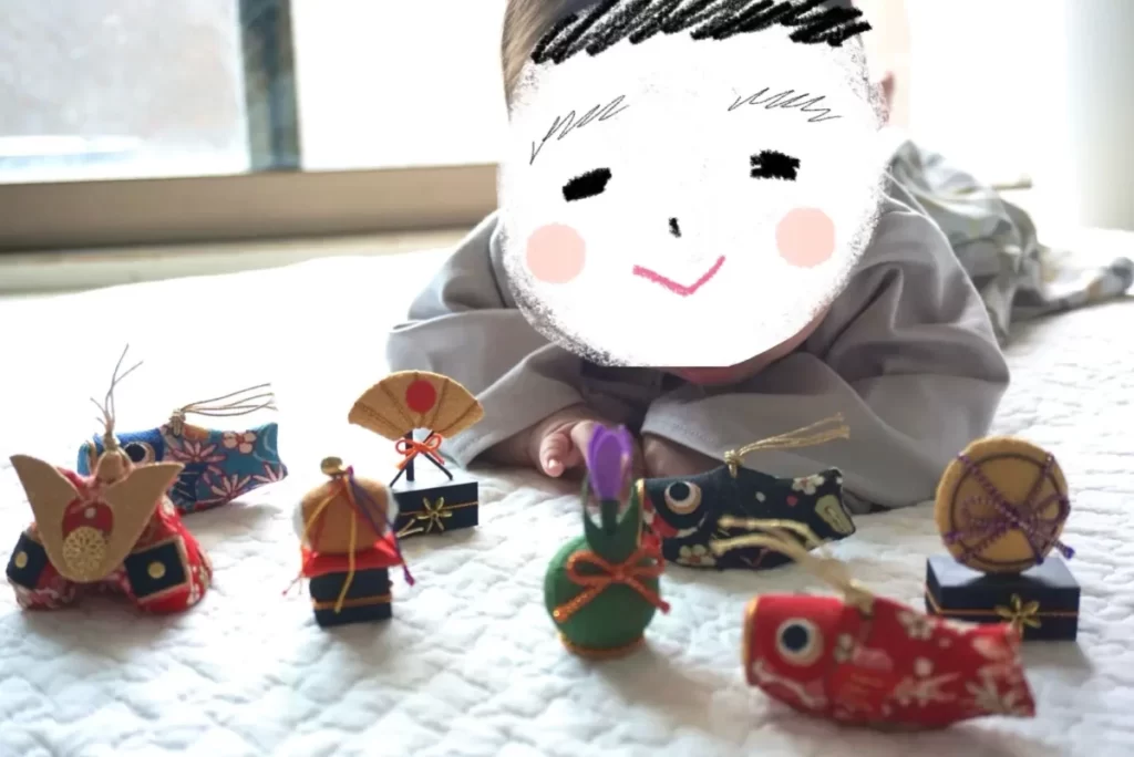 ちりめんの五月人形とあかちゃん